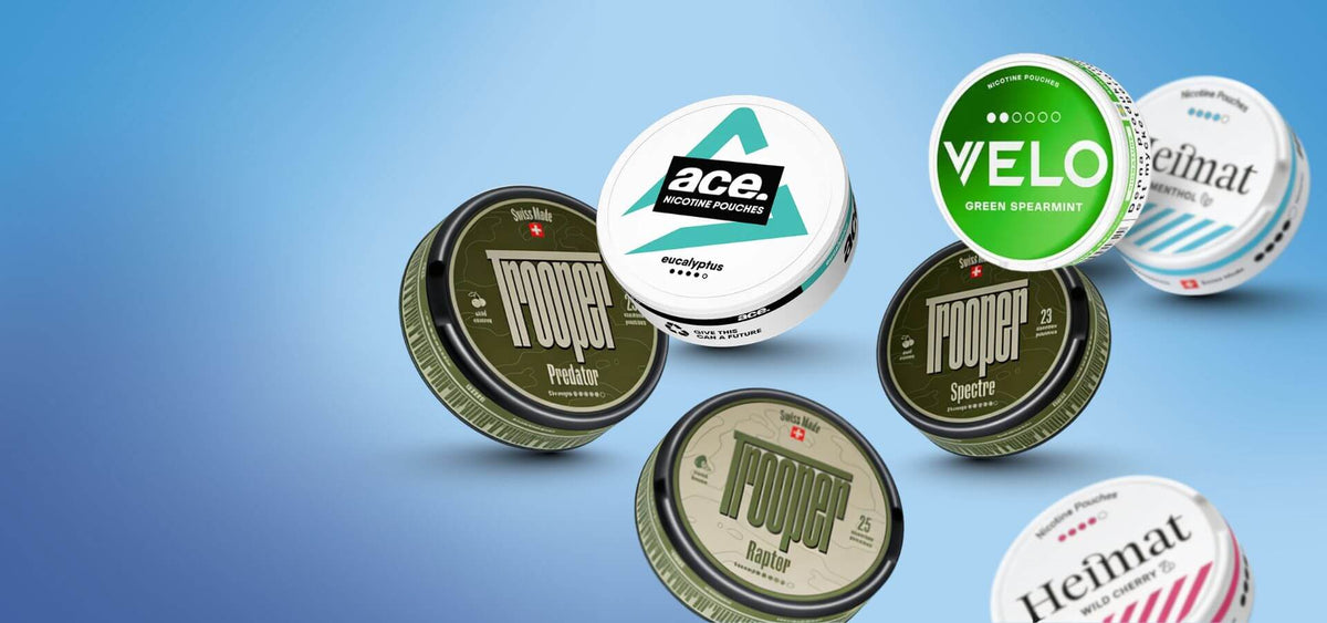Seleção de Snus e Nicotine Pouches: Nоoper, Velo Green Spearmint e latas Heimat em fundo azul